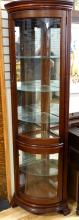 BOW-FRONT CORNER CURIO CABINET