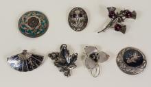 SEVEN STERLING BROOCHES