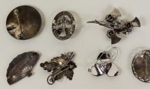 SEVEN STERLING BROOCHES