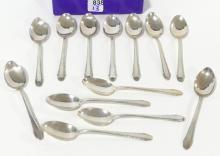 THIRTEEN STERLING DEMITASSE SPOONS