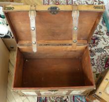 TWO WOOD STORAGE TRUNKS