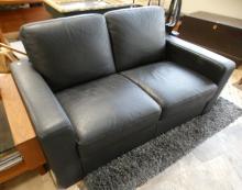 NATUZZI BLACK LEATHER LOVESEAT