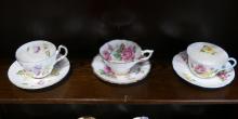 SEVEN ENGLISH CUPS AND SAUCERS