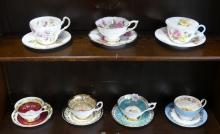 SEVEN ENGLISH CUPS AND SAUCERS