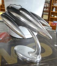 STEALTH BOMBER SCULPTURE AND WASTEBASKET