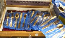 GOLD-PLATED FLATWARE IN CANTEEN