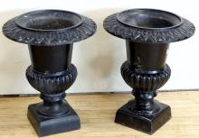 PAIR OF CAST IRON GARDEN URNS