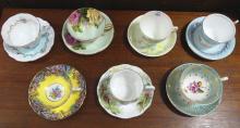 SEVEN ENGLISH CUPS AND SAUCERS