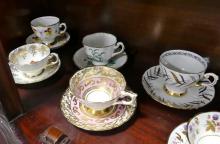 TEA  CUPS AND SAUCERS