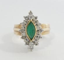 GOLD RING WITH EMERALD AND DIAMONDS