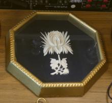 THREE CARVED IVORY WALL PLAQUES