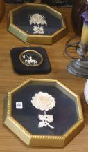 THREE CARVED IVORY WALL PLAQUES