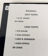 BINDER OF 1957 AND 1958 TOPPS BASEBALL CARDS