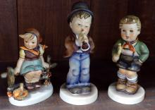 SEVEN HUMMEL FIGURINES