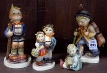 SEVEN HUMMEL FIGURINES