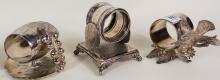 FIVE FIGURAL NAPKIN RINGS