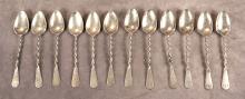 SET OF TWELVE SILVER SPOONS