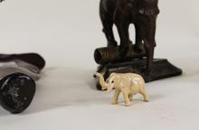 FOUR METAL "ELEPHANT" SCULPTURES