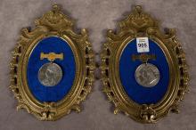 TWO FRAMED ROYALTY MEDALS