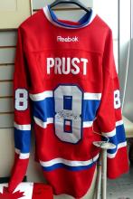 AUTOGRAPHED JERSEY AND PADDLE BLADE