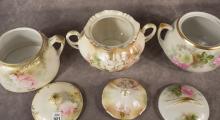 THREE PORCELAIN BISCUIT JARS