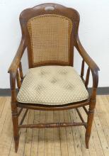 CANED OAK ARMCHAIR