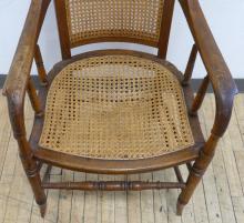 CANED OAK ARMCHAIR