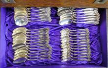 EXTENSIVE FLATWARE SERVICE IN OAK CANTEEN WITH STAND