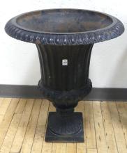 PAIR OF CAST IRON GARDEN URNS