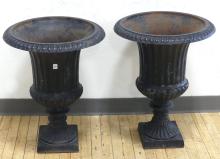 PAIR OF CAST IRON GARDEN URNS