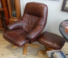 BROWN LEATHER RECLINER AND FOOTSTOOL