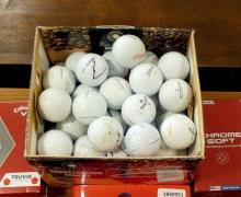 GOLF BALLS AND BOOK