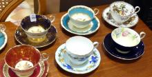 NINE AYNSLEY CUPS AND SAUCERS