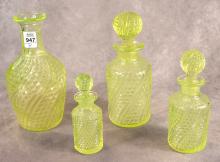 SET OF FOUR GRADUATED VASELINE GLASS CRUETS