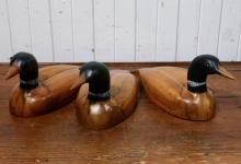 CARVED WOOD LOONS