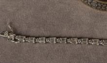 TWO SILVER BRACELETS