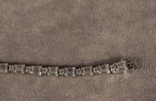 TWO SILVER BRACELETS