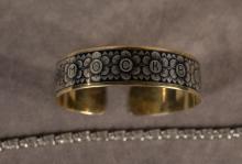 TWO SILVER BRACELETS