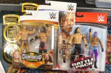 FIVE WWE ACTION FIGURE BOX SETS