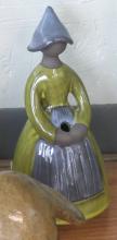 THREE ART POTTERY FIGURINES