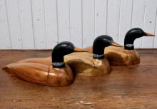 CARVED WOOD LOONS