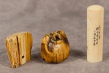 TWO IVORY NETSUKES AND WAX SEAL