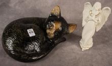 TWO FIGURINES