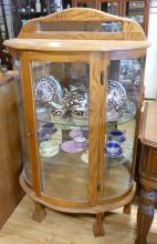 DIMINUTIVE BOW-FRONT CHINA CABINET